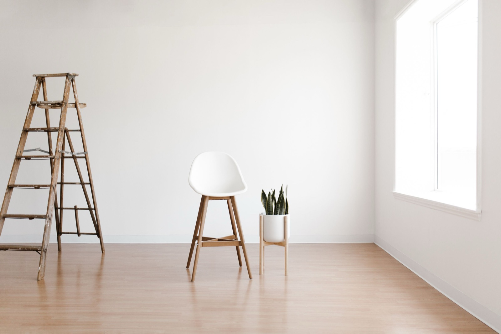 Inside on the wall of a white room, to-scale simulation